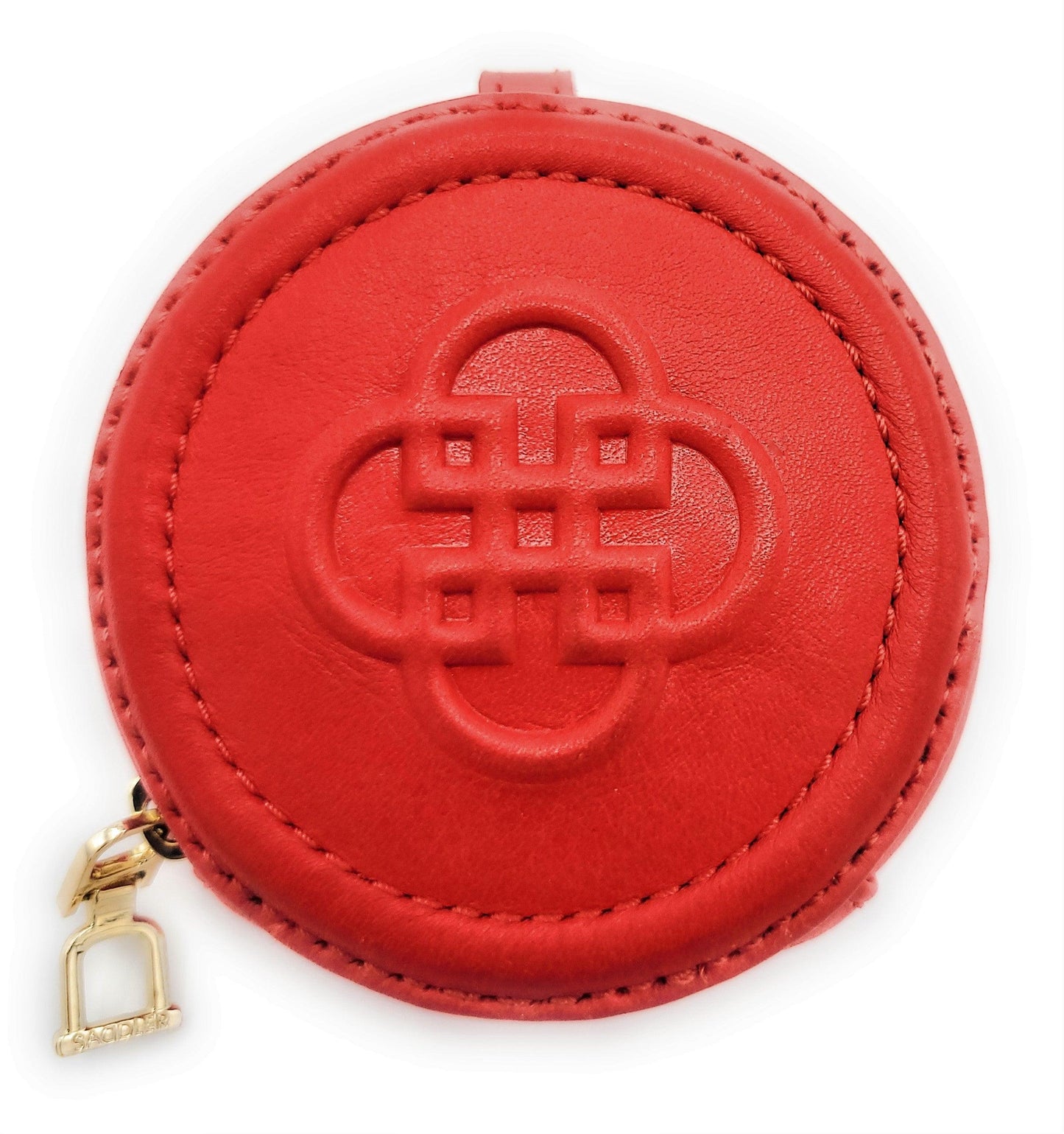 Red round coin purse with a gold zipper on a white background