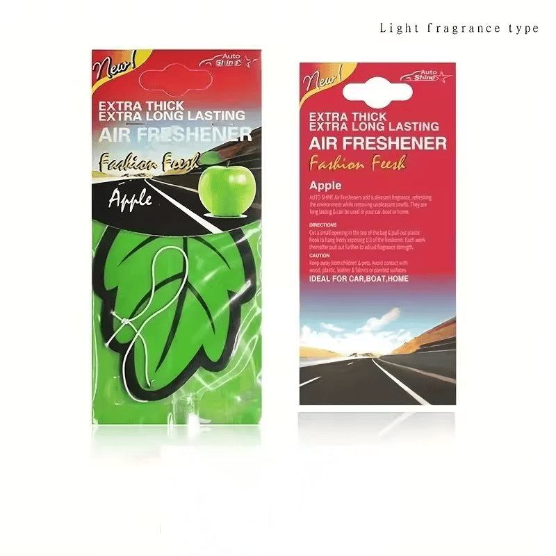 Two packages of air freshener with green and red designs on a white background