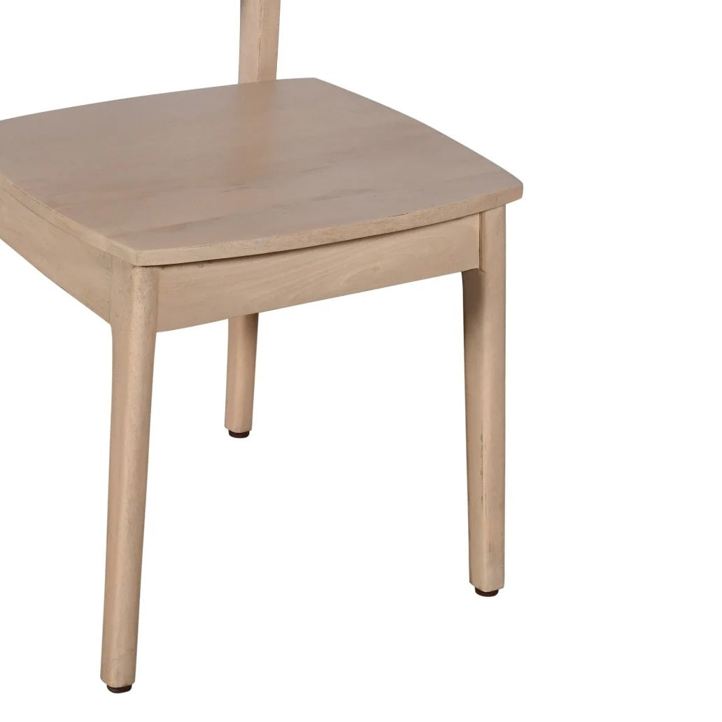 Wooden chair with a light finish on a white background