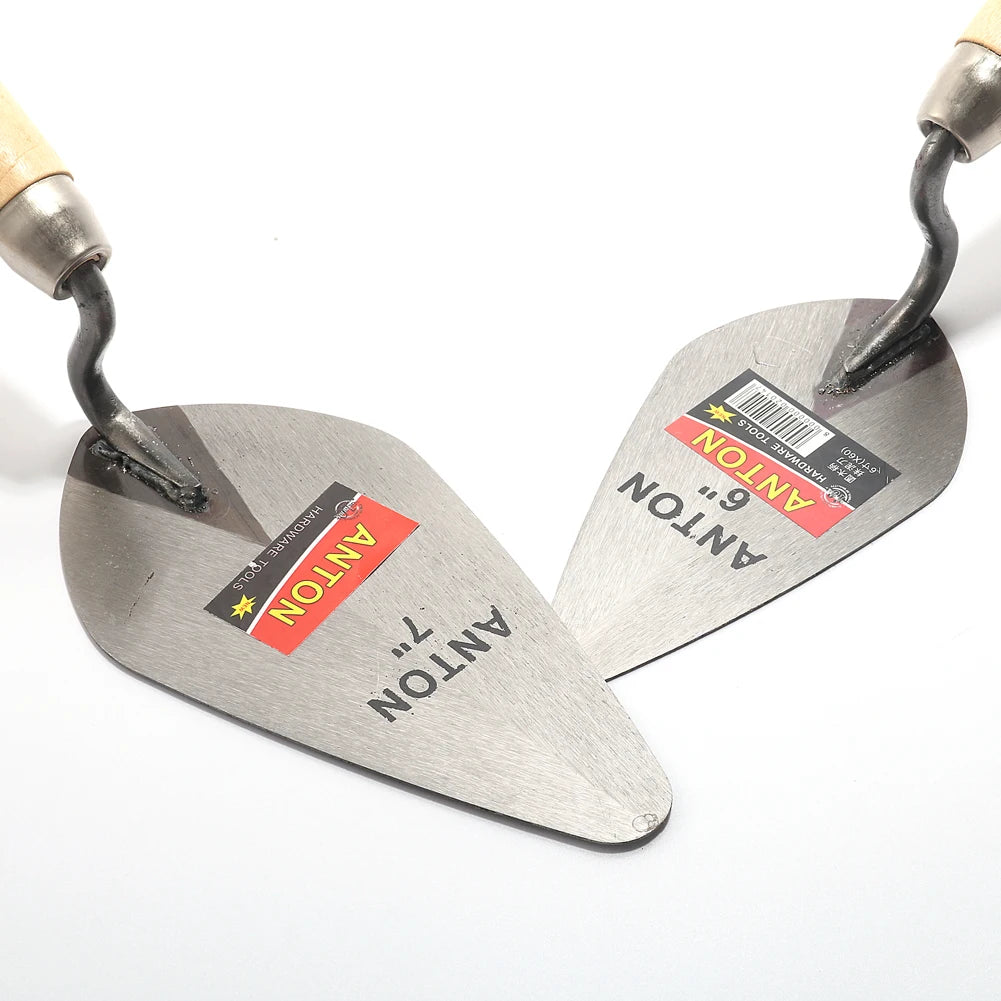 Two construction trowels with 'ANTON' branding on a white background
