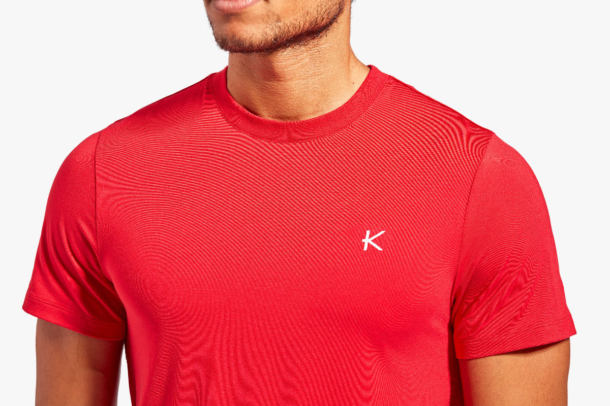 Red t-shirt with a logo on a white background