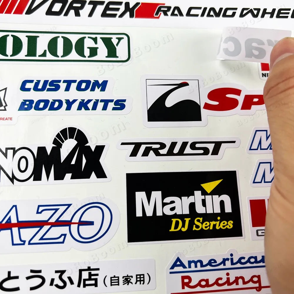 Collection of various brand stickers on a white background with a hand holding a sticker.