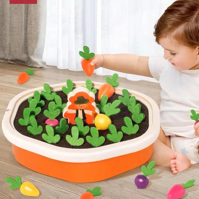 Child playing with a toy garden set on a wooden floor.