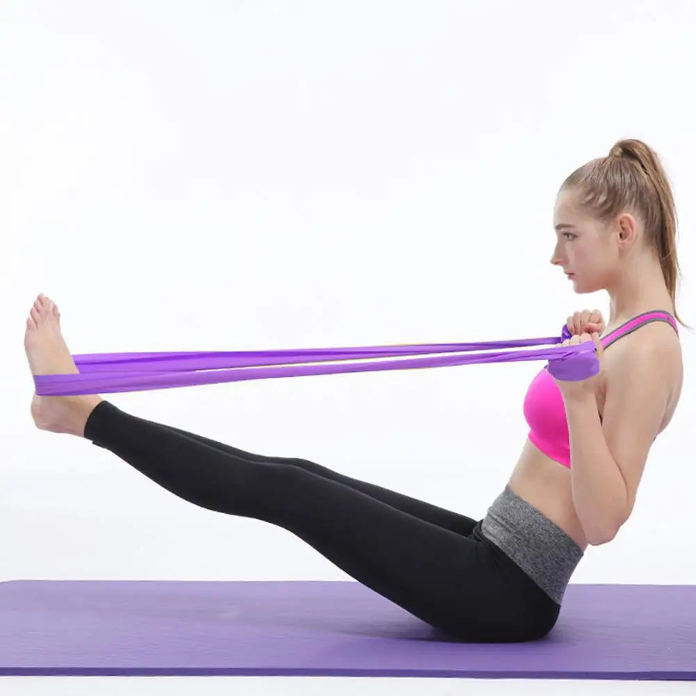 Woman exercising with a resistance band on a white background