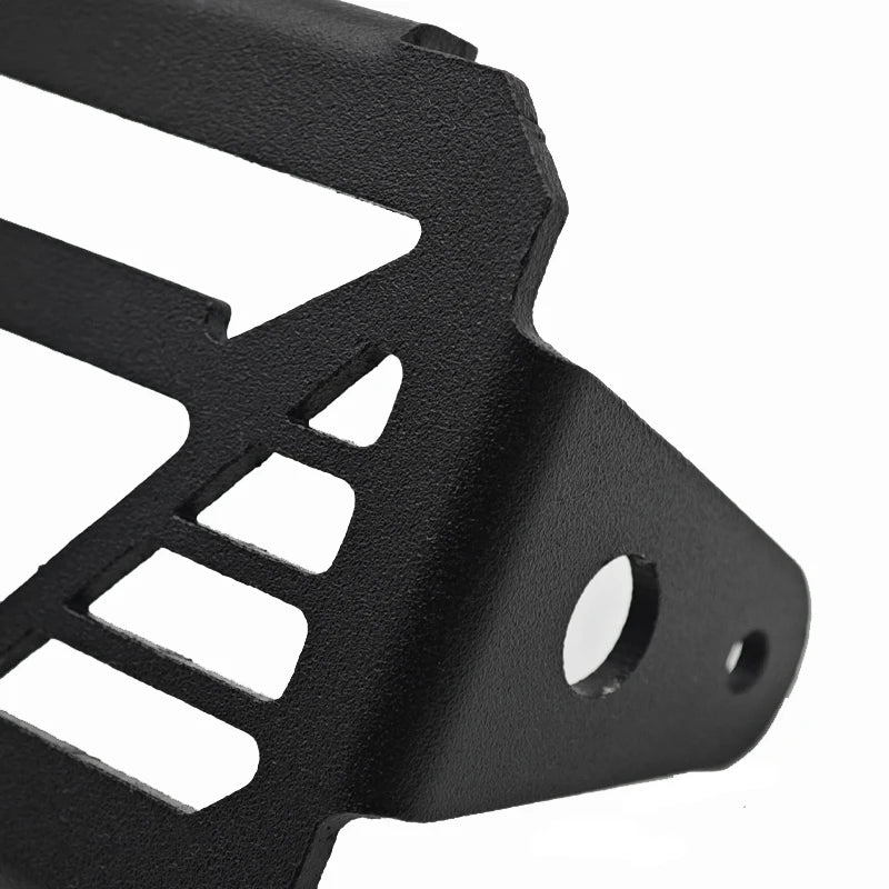 Black metal grille on a white background