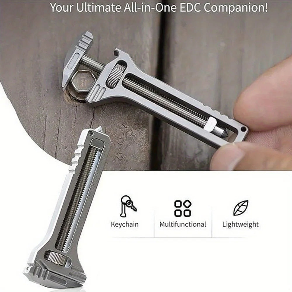 Multifunctional tool with keychain attachment on a wooden background