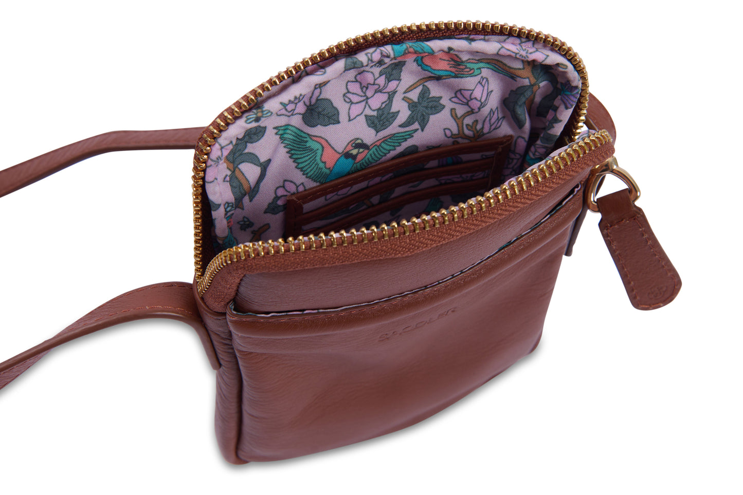 Brown leather crossbody bag with floral interior on a white background