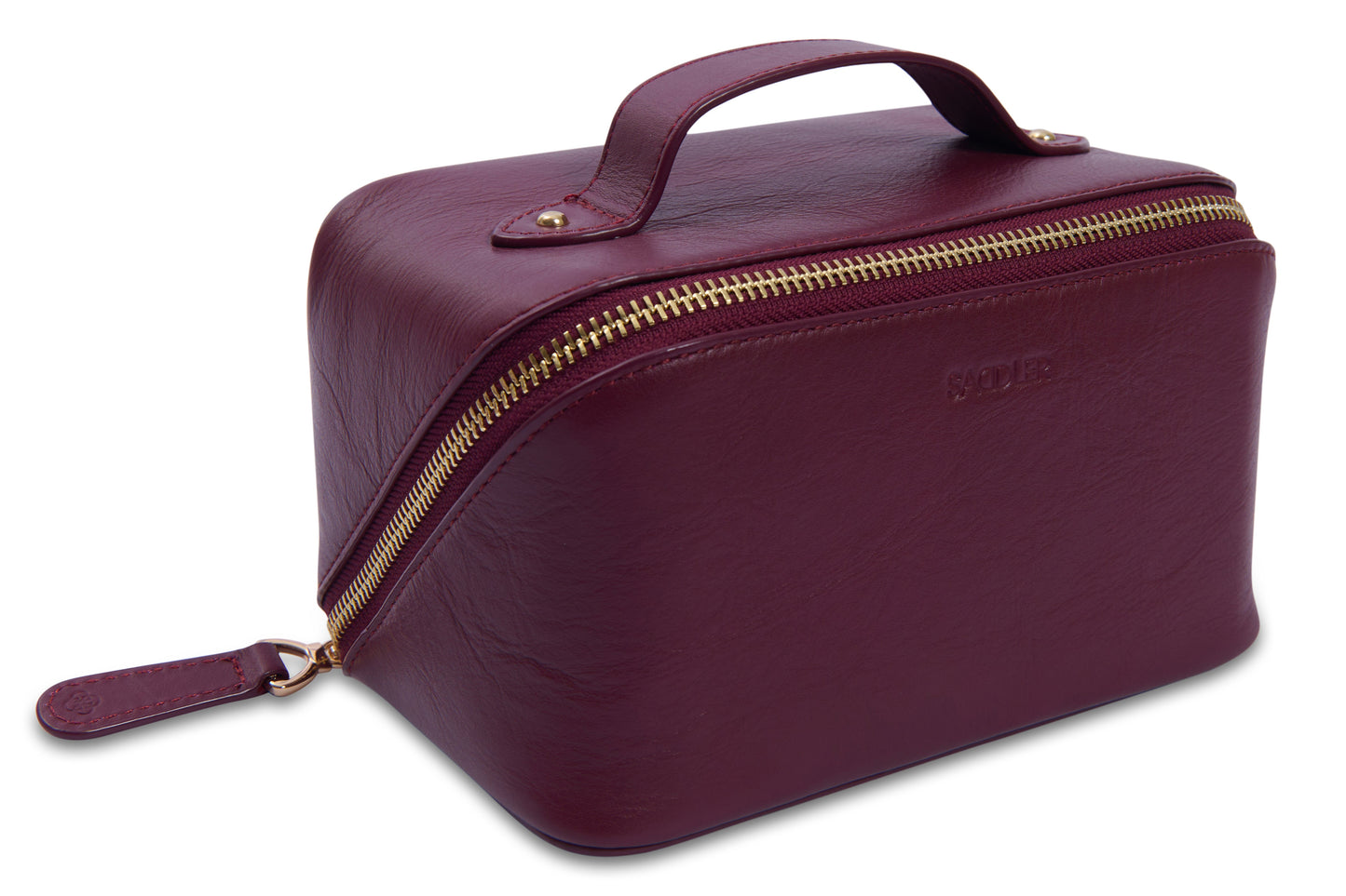 Maroon toiletry bag with gold zipper on a white background