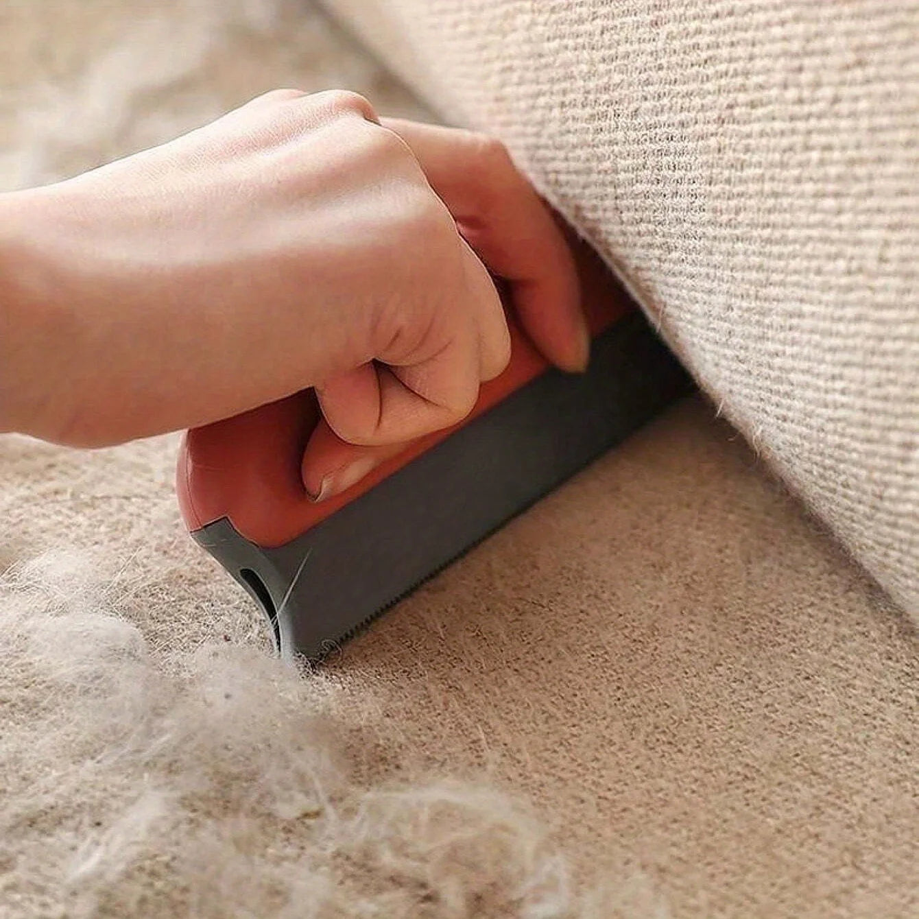 Brosse pour enlever les poils d'animaux
