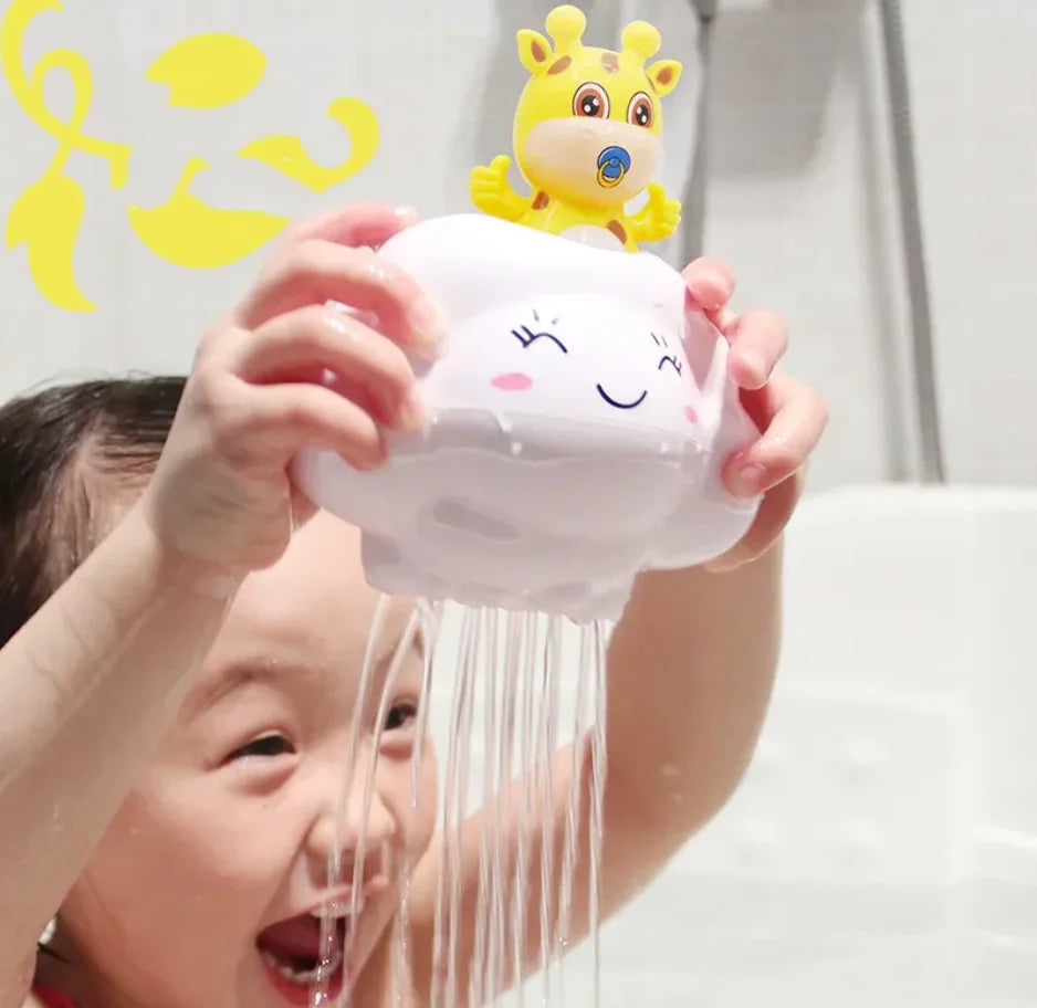 Child holding a cloud-shaped toy with water coming out, against a light background.