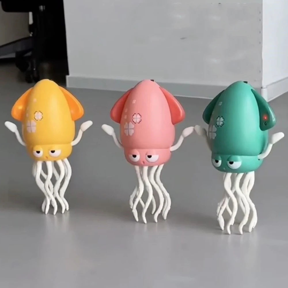Three colorful toy squids on a gray surface
