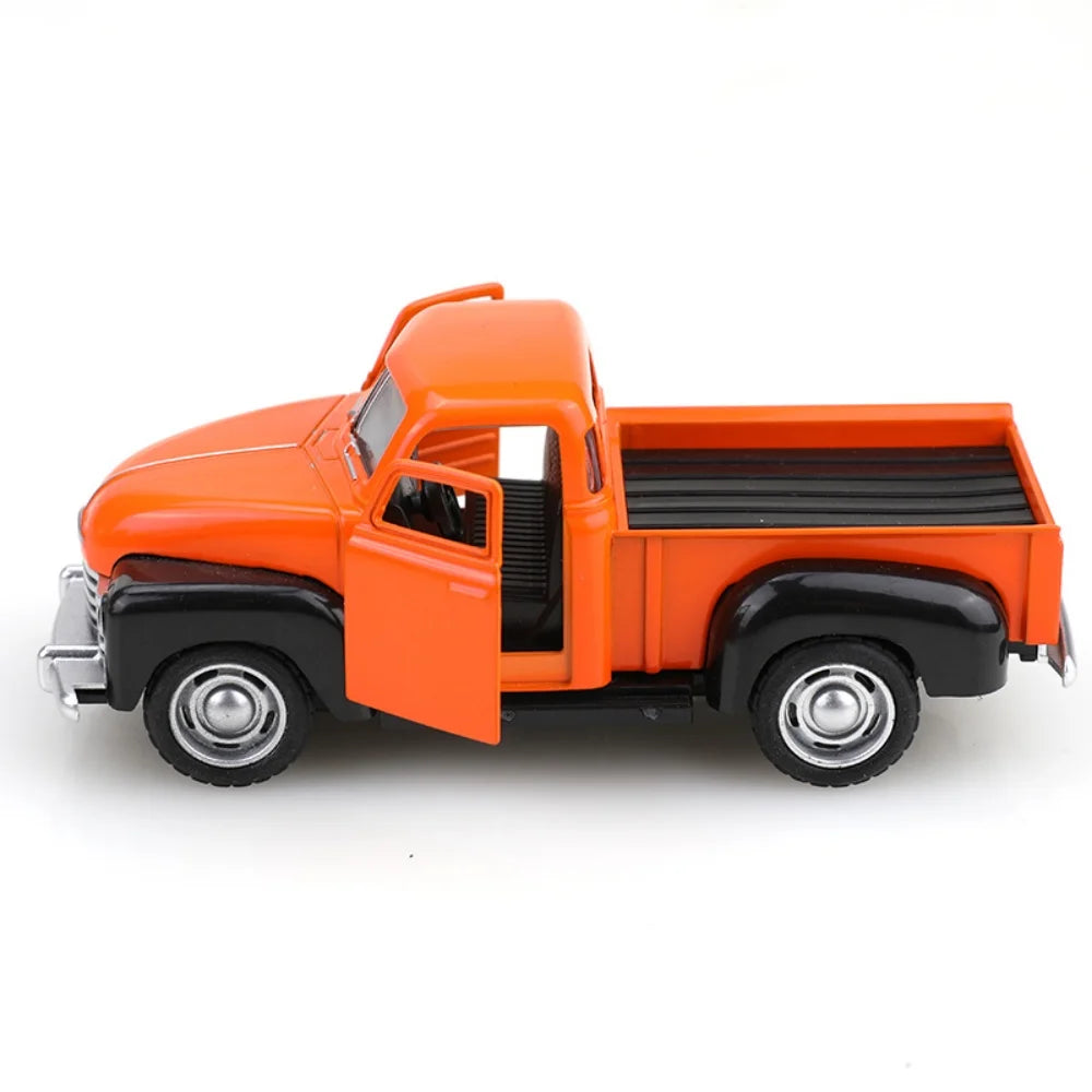 Model of an orange pickup truck on a white background