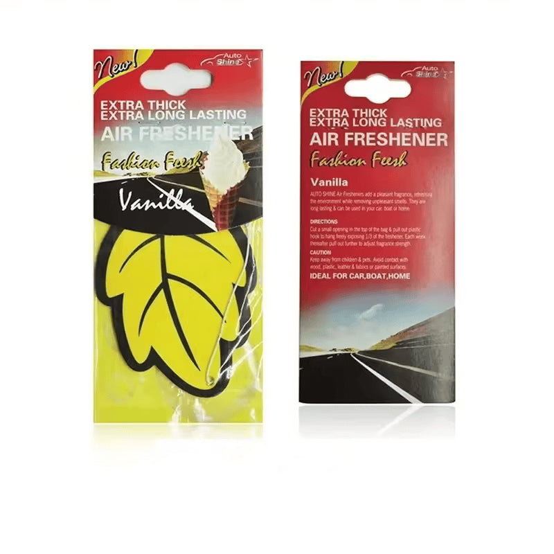 Two packages of air freshener with a leaf design on a white background