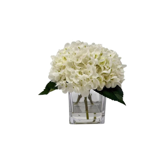 Arreglo floral de hortensias color crema artificial en jarrón cuadrado de vidrio