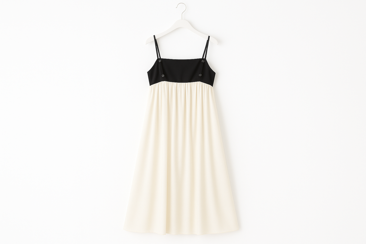 Professional product image of contrast sling dress on hanger