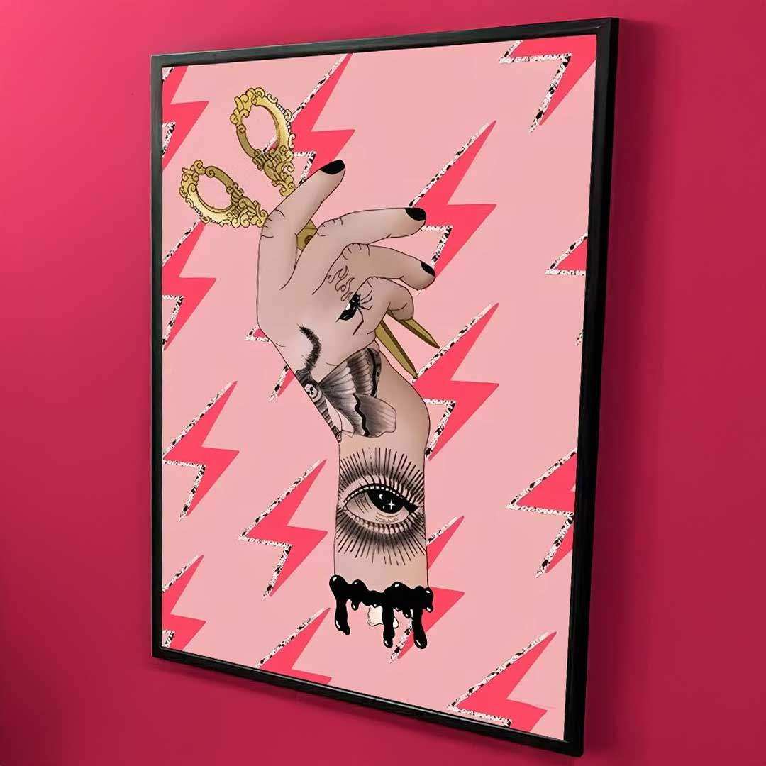 Framed artwork with abstract design on a pink background