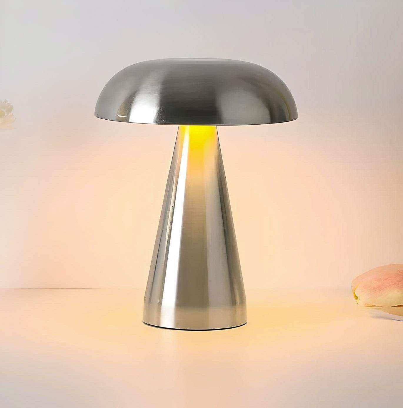 Metallic table lamp on a soft focus background