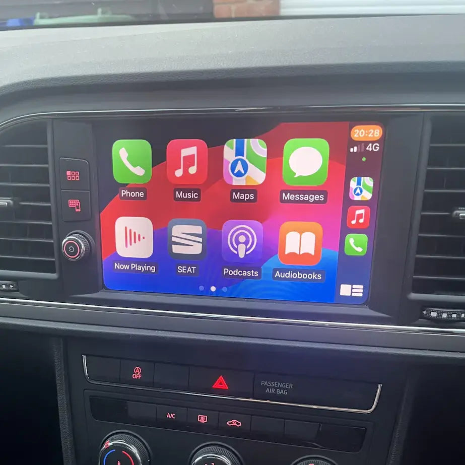 Car dashboard with a touchscreen display showing app icons