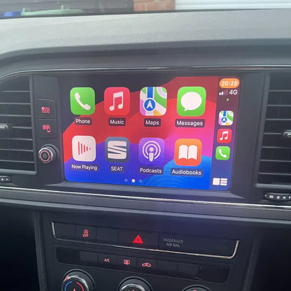 Car dashboard with a touchscreen display showing app icons