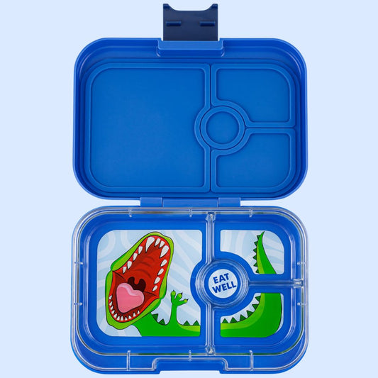 Blue bento box with a cartoon dinosaur design on a light blue background