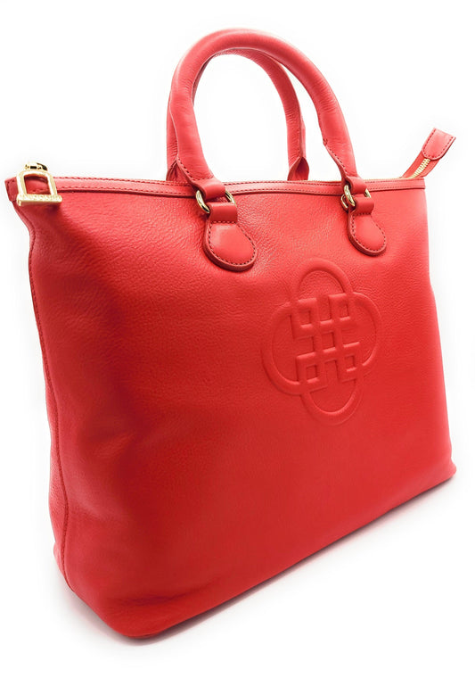Red handbag with a gold clasp on a white background