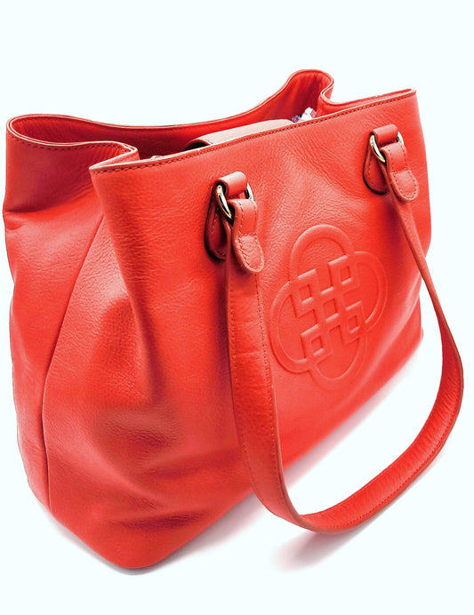 Red handbag with a brand logo on a white background