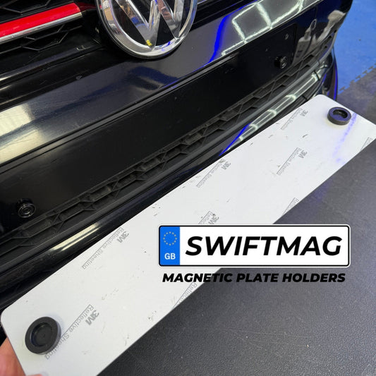 Swiftmag magnetic plate holder on a car grill with Volkswagen logo