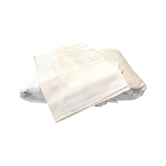 White folded bedsheets on a white background