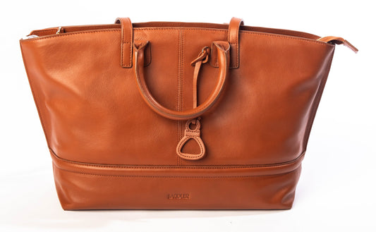 Brown leather tote bag with a visible brand logo on a white background