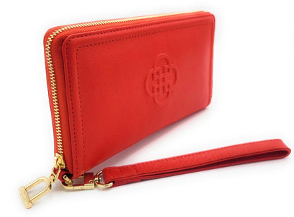 Red wallet with gold zipper and strap on a white background
