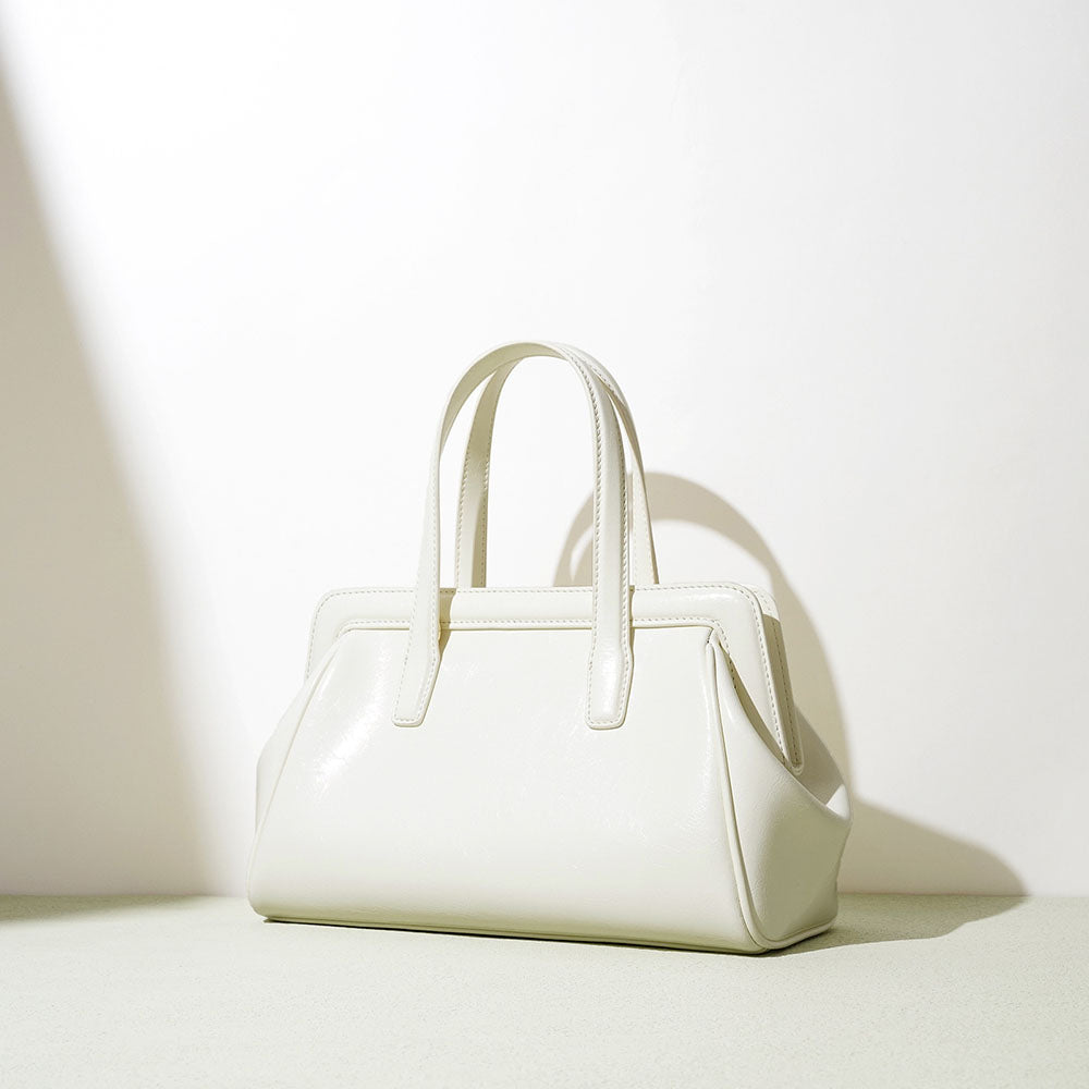 The Pearl Arc Structured Leather Satchel Bag