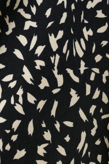 Black fabric with white abstract pattern