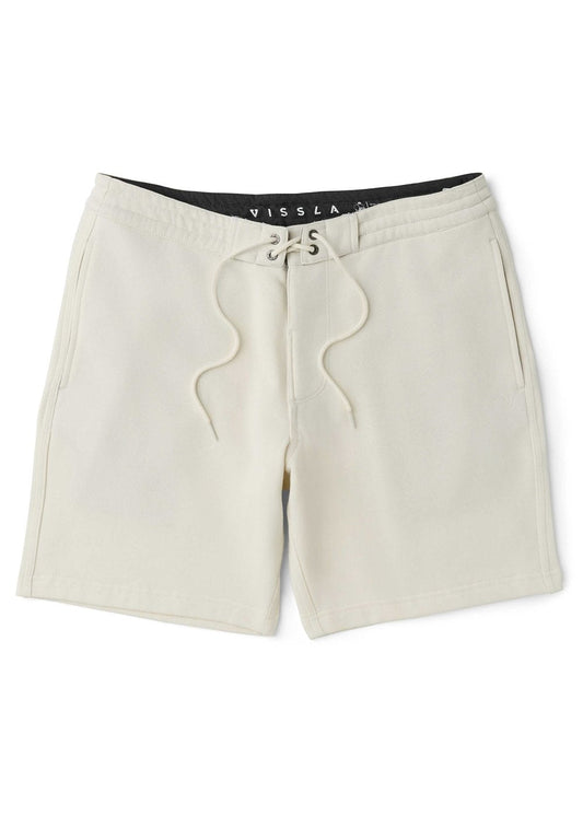 Beige shorts with a brand logo on a white background