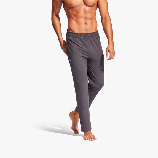 Man wearing gray pants on a white background