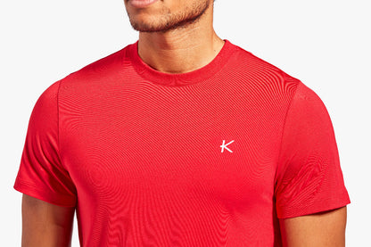 Red t-shirt with a logo on a white background