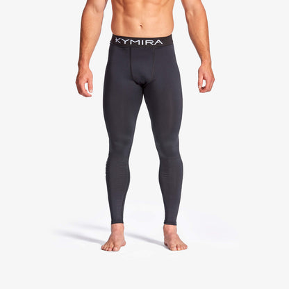 Person wearing black compression leggings with 'Kymira' branding on a white background
