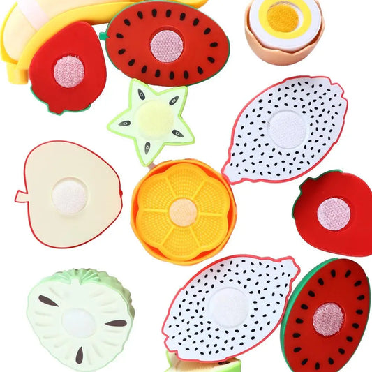 Set of colorful fruit-shaped toys on a white background