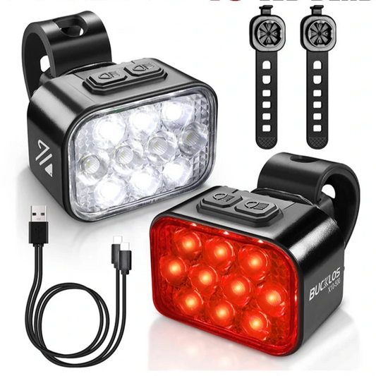Bicycle lights with USB cable and additional LED beads on a white background.