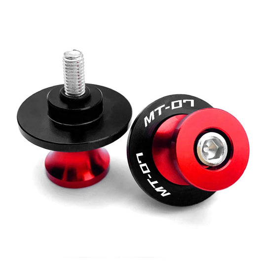 Two motorcycle standoffs with red and black design on a white background
