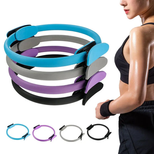 Set of resistance bands in blue, gray, purple, and black with a person wearing one on a white background.
