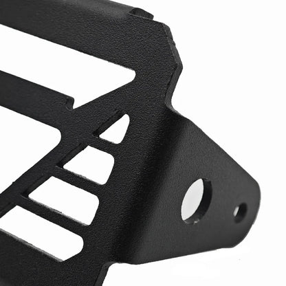 Black metal grille on a white background