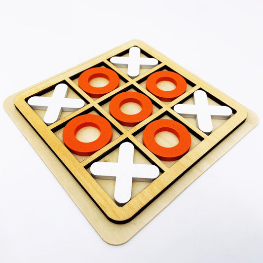 Wooden tic-tac-toe game with red and white pieces on a white background