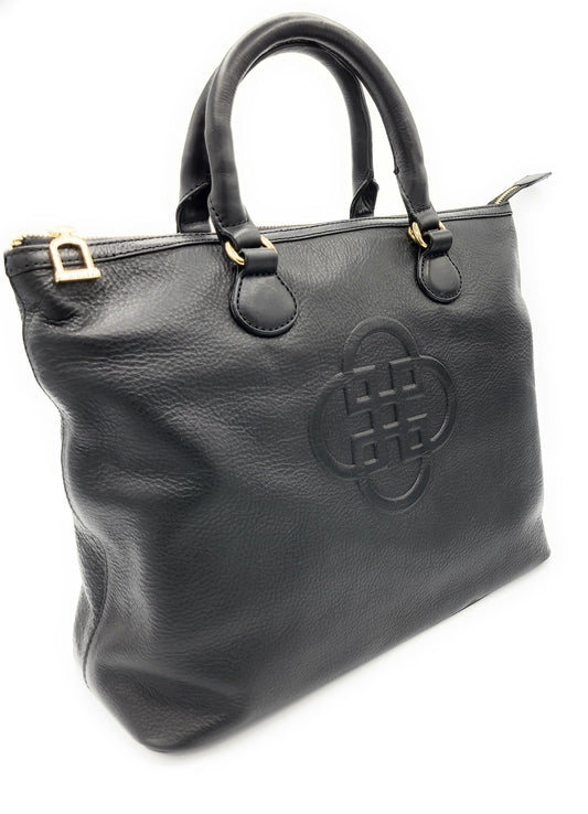 Black handbag with a gold buckle on a white background