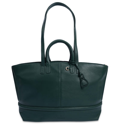 Green leather handbag on a white background