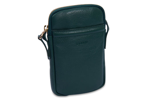 Green leather crossbody bag on a white background