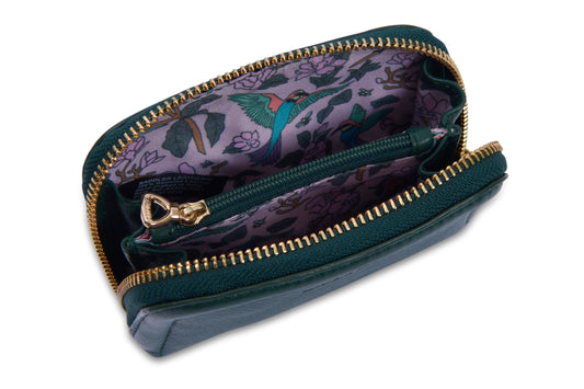 Open teal wallet with floral interior on a white background