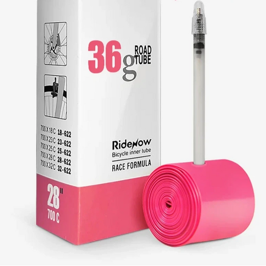 Pink bicycle inner tube with packaging and 'RideNow' branding on a white background