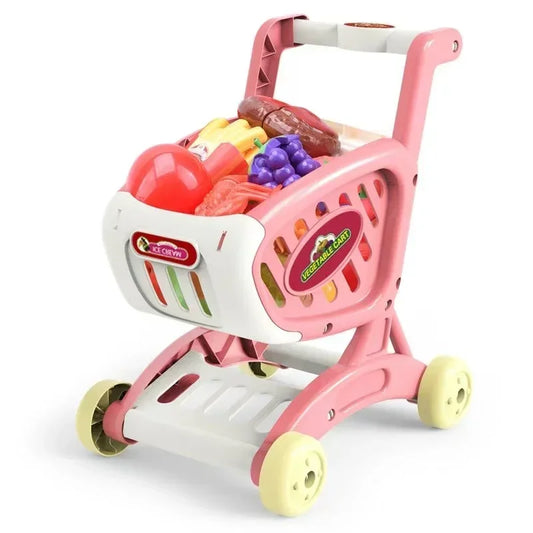 Pink toy shopping cart with groceries on a white background