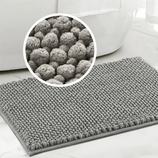 Gray bath mat with close-up of texture on a light background