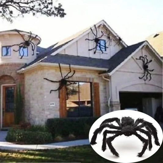 Halloween spider decorations on a house exterior with a close-up of a spider.